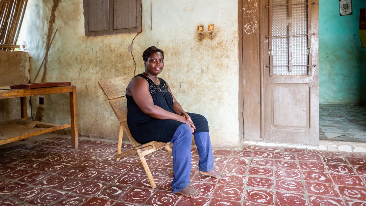 Rosine sat on a chair