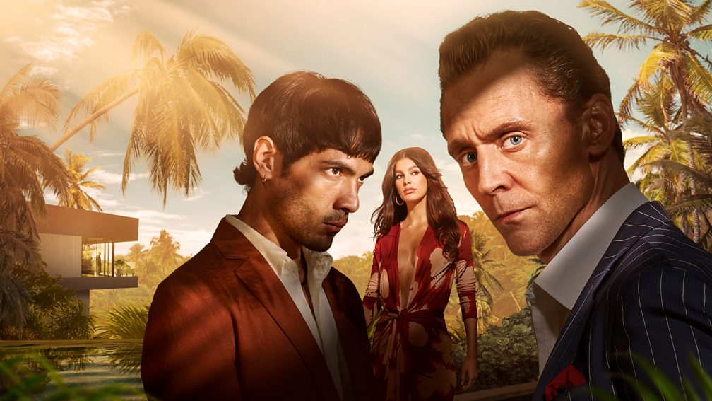 Promotional image for The Night Manager featuring the main character looking directly at the camera while two others are just behind in a tropical background