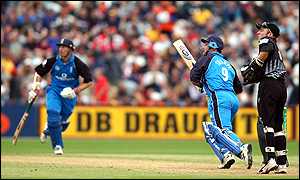 Matthew Hoggard celebrates with team-mates after one of his two wickets 
