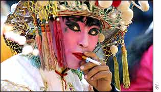 Temple performer smoking