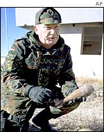 Member of a German ordnance disposal unit 