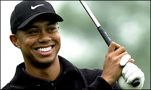 Golfer Tiger Woods, wearing Nike cap