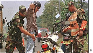 Police search motorcyclist
