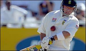 Herschelle Gibbs withstands a short delivery