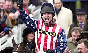 Jockey Richard Johnson celebrates victory in the Queen Mother Champion Chase