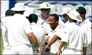 Paul Adams celebrates the wicket of Steve Waugh