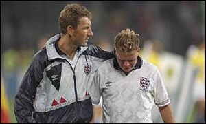 Terry Butcher consoles a distraught Gascoigne after England's semi-final defeat to Germany in the 1990 World Cup
