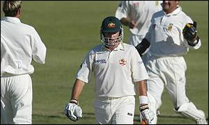 Mark Waugh begins the long walk back to the pavilion