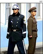 South Korean solider (l) and North Korean soldier (r) on the Korean border