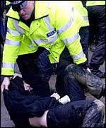 Policeman gripping saboteur