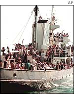 Roma illegal immigrants packed onto a tugboat 