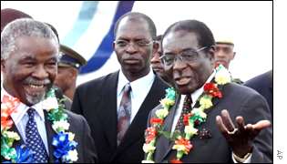 Thabo Mbeki (left) and Robert Mugabe (right)