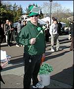 Protestor dressed in green