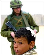 Palestinian child at a checkpoint in Mawasi
