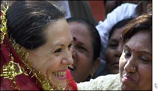 Congress party chief Sonia Gandhi being greeted by supporters in Delhi