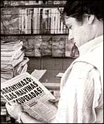 Argentine man reading newspaper