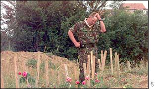 A British soldier at the site of a mass grave in Kacanik, Kosovo