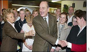Mr Chirac and his wife Bernadette shake hands with supporters