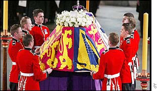 The Queen Mother's coffin is put into place