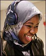 Woman with headset laughing