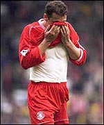 Ginaluca Festa is inconsolable after scoring the own goal that gifted Arsenal victory