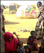 Somali women and children outside their huts in Mandera, Kenya