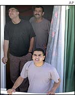 Palestinian militants on the balcony of their hotel room in Cyprus