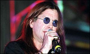 Ozzy Osbourne performing with his band, Black Sabbath