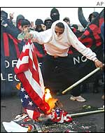 Protesters burns US flag