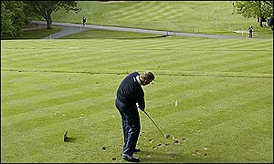 Colin Montgomerie tees off at the second hole