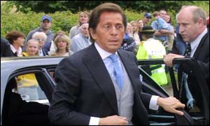 Design guru Valentino came dressed formally for the occasion