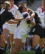 Selena Rudge of England is tackled by Anna Richards 