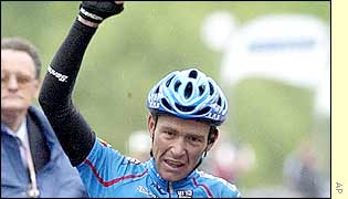 Italy's Denis Lunghi celebrates a monumental effort in the rain