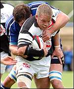 Jon Bryant tries to escape the clutches of Scott Lines