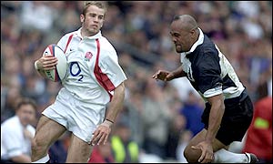 England wing James Simpson-Daniel glides past Jonah Lomu before touching down in the corner for the try of the match