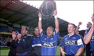 Jason Robinson enjoys the moment as he lifts the trophy