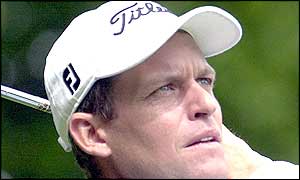 Denmark's Anders Hansen drives at the second hole