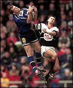 Sale's Mark Cueto jumps with Pontypridd's Richard Johnston