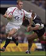 James Simpson-Daniel rounds Jonah Lomu for a superb individual try