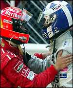 Michael Schumacher congratulates David Coulthard