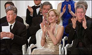 American director Lynch (left) with actress Stone (centre)
