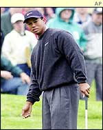 Tiger Woods watches as another putt slips by the hole