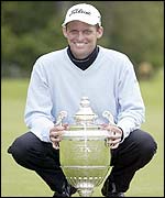Denmark's Anders Hansen poses with the PGA Championship trophy