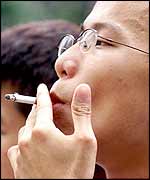 Young Chinese man smoking