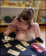 girl playing with puzzle