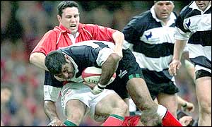 Barbarians' Jim Williams is tackled by Stephen Jones 