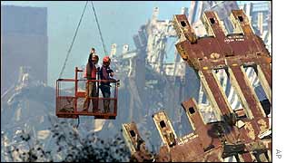 Rescuers hoisted above the wreckage on 16 September