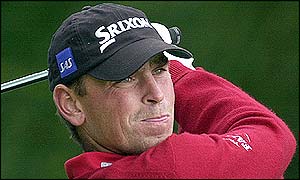 Denmark's Thomas Bjorn drives at the 13th