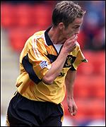 David Bingham celebrates a goal for Livingston