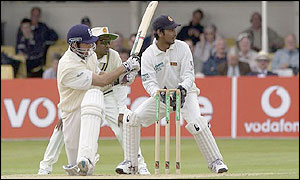 Murali is on the receiving end here but later strikes to dismiss the England batsman